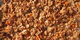 granola with oats pecans walnuts apricots coconut flakes raisins maple syrup olive oil and brown sugar