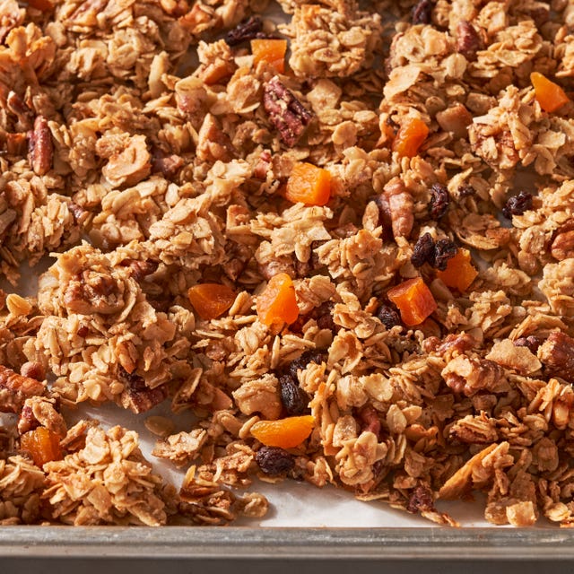 granola with oats pecans walnuts apricots coconut flakes raisins maple syrup olive oil and brown sugar