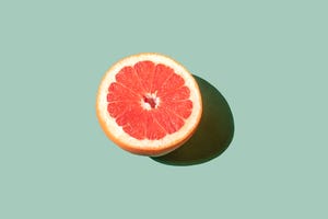 grapefruit on the green background