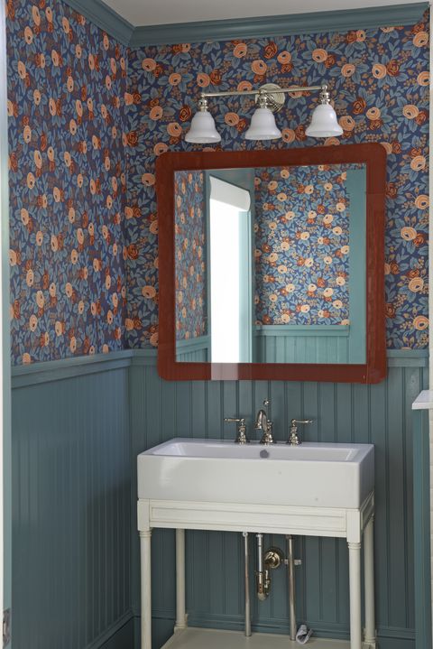 powder room with saturated floral wallpaper