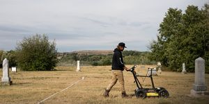 jordan swenson demonstrates how he collects data with ground penetrating radar, at nutana cemetery, a historical burial ground dating back to 1884, in saskatoon, saskatchewan monday, august 23, 2021 the technology has been behind many of the discoveries of unmarked graves at former indian residential schools, but reliably identifying graves requires direction from both oral histories, and a careful interpretation of data