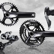 Bicycle part, Bicycle drivetrain part, Groupset, Crankset, Derailleur gears, Bicycle pedal, Auto part, Vehicle, Bicycle wheel, Hub gear, 