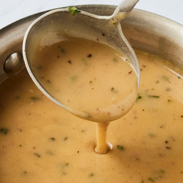 a bowl full of brown gravy