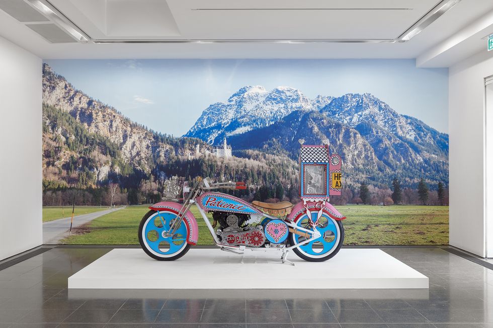 grayson perry’s well travelled custom kenilworth am1 harley davidson knucklehead motorcycle he named ‘patience’ — with alan measles shrine on the rear — at ‘grayson perry the most popular art exhibition ever’, serpentine gallery, london 8 june–10 september 2017