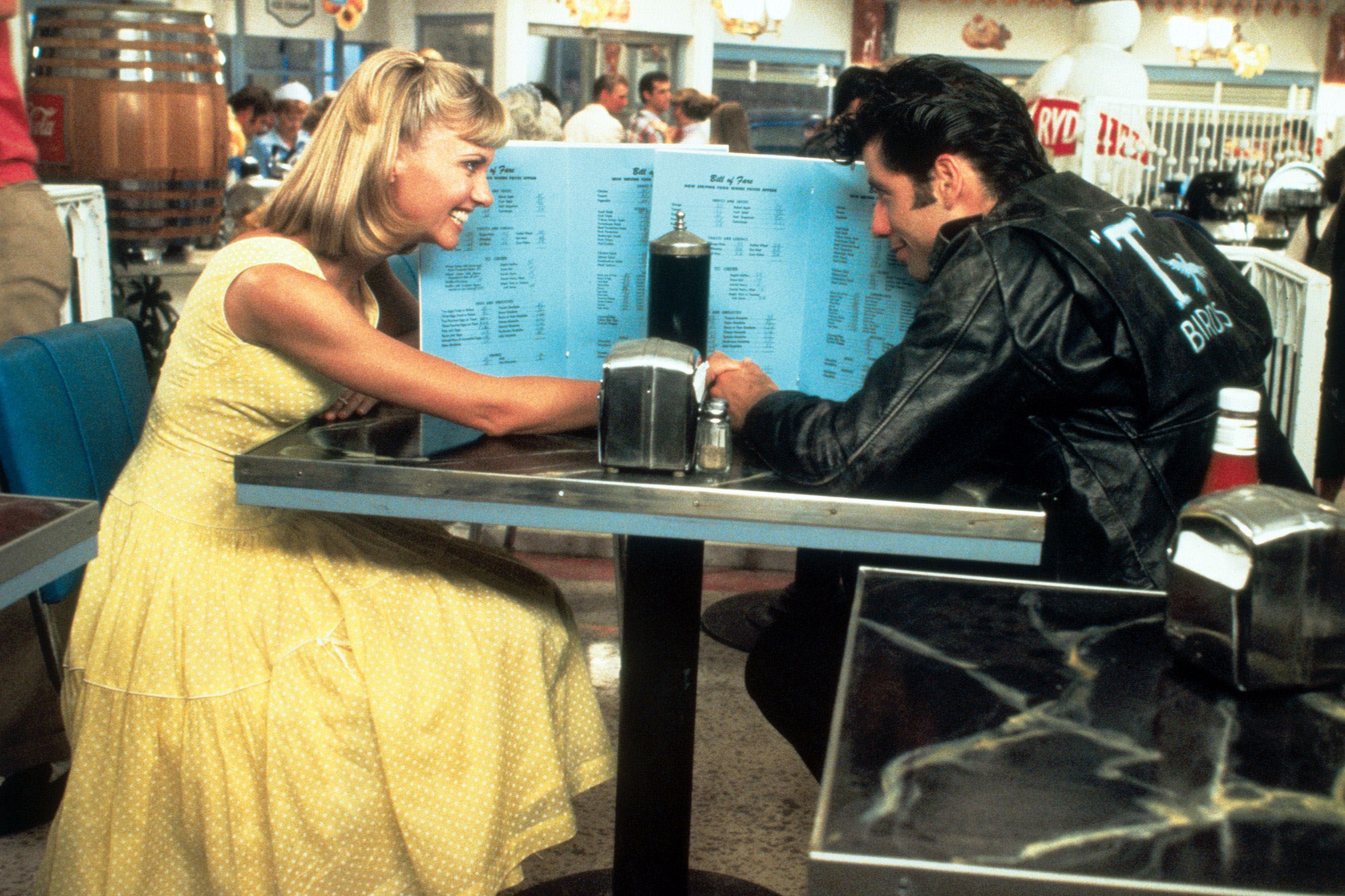 Olivia Newton-John and John Travolta just dressed up in their Grease  costumes