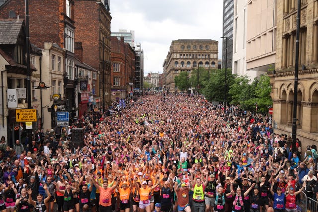 aerial view of a large crowd of runners assembled for a race