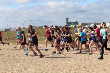runners on a beach taking part in a parkrun