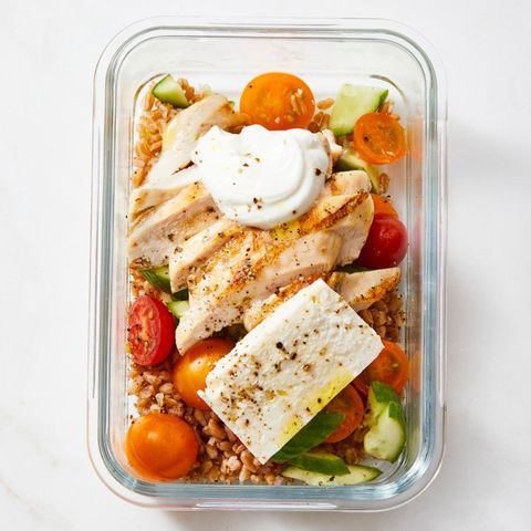 greek chicken grain bowl with tomatoes