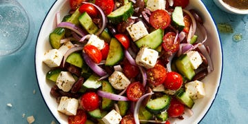 greek salad with cucumber, tomatoes, red onion, olives, and feta