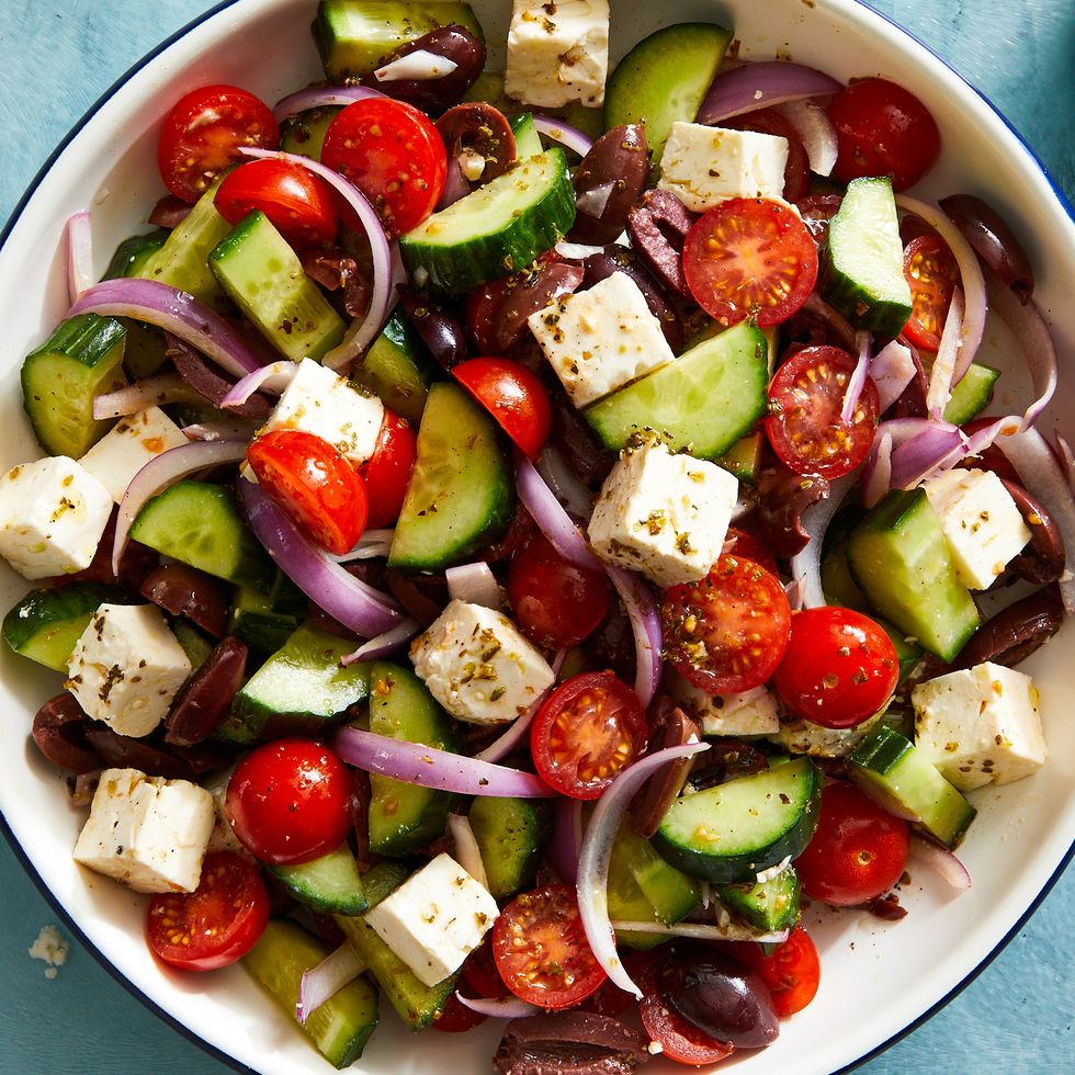 greek salad with cucumber, tomatoes, red onion, olives, and feta