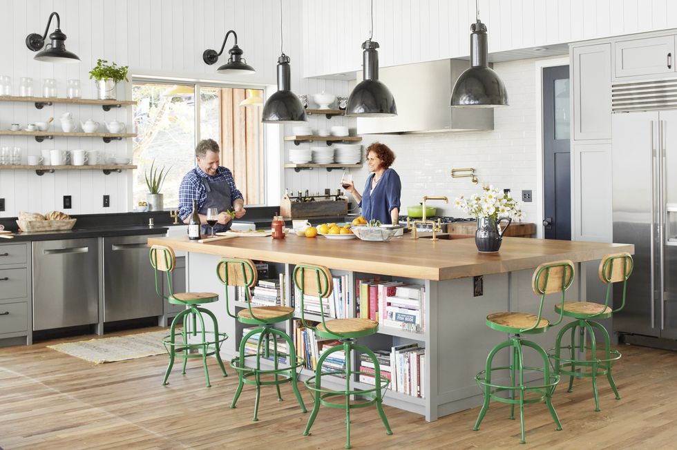 modern farmhouse kitchen with green stools