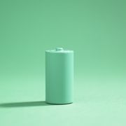 green battery on green background