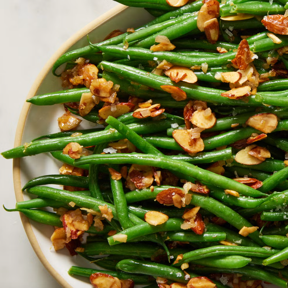 green beans with sliced almonds on top