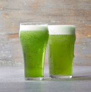 two glasses of light green beer