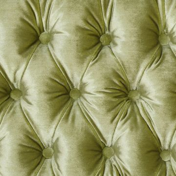 green capitone tufted fabric upholstery texture