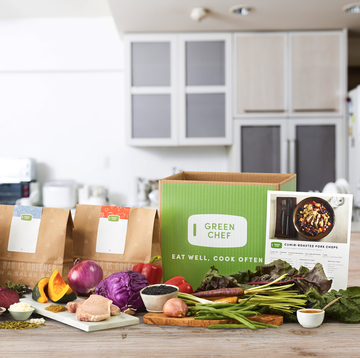 green chef meal delivery kit review food items and box on a kitchen island