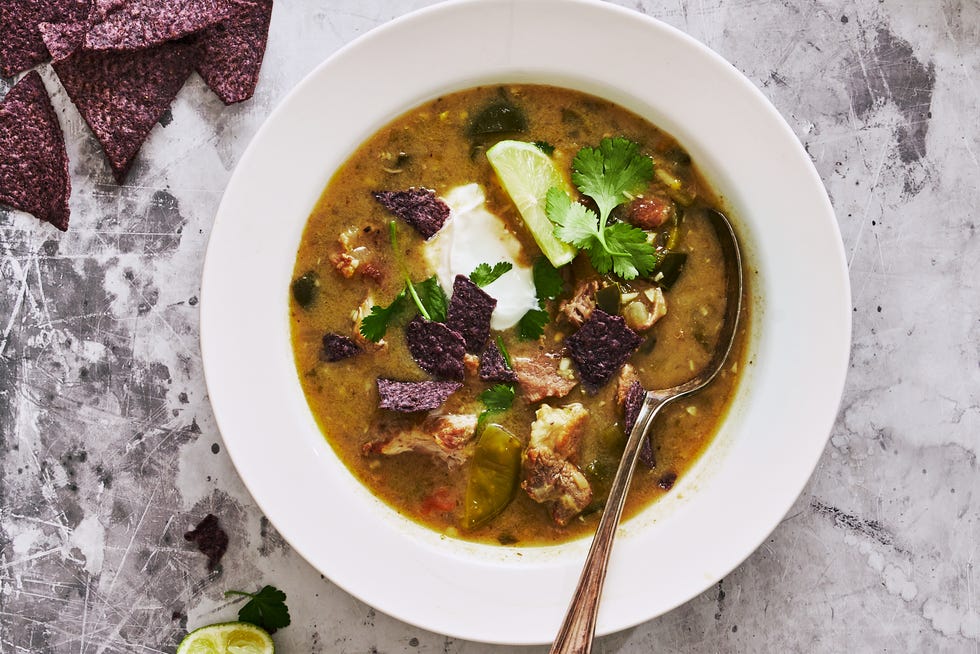 green chili pork stew topped with blue corn tortilla chips