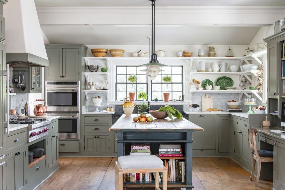 green kitchen in an 1850s maryland farmhouse with open shelves