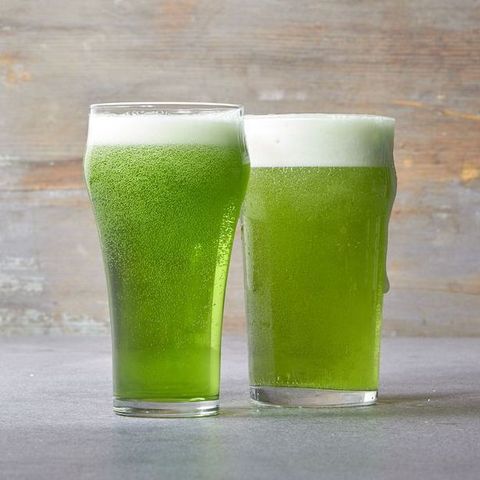 two glasses of light green beer