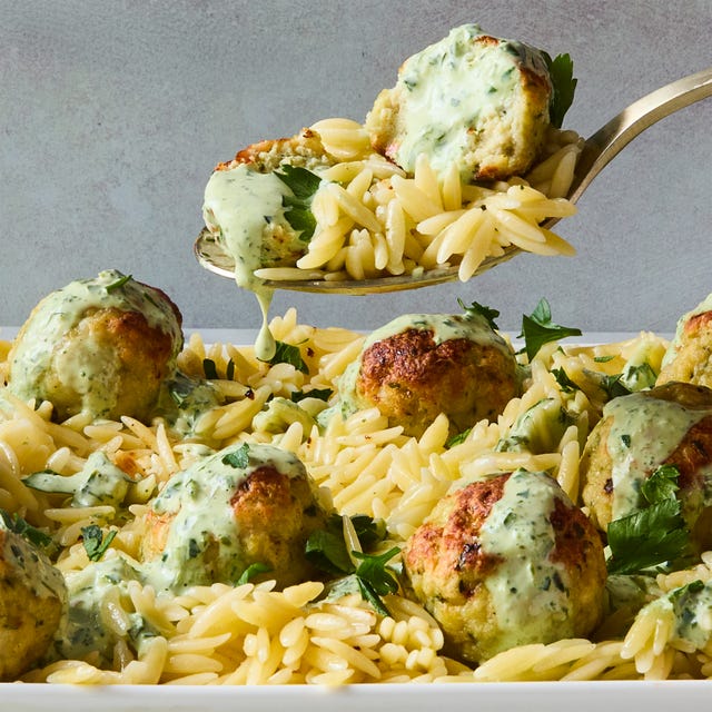 meatballs served on top of orzo with creamy green goddess dressing