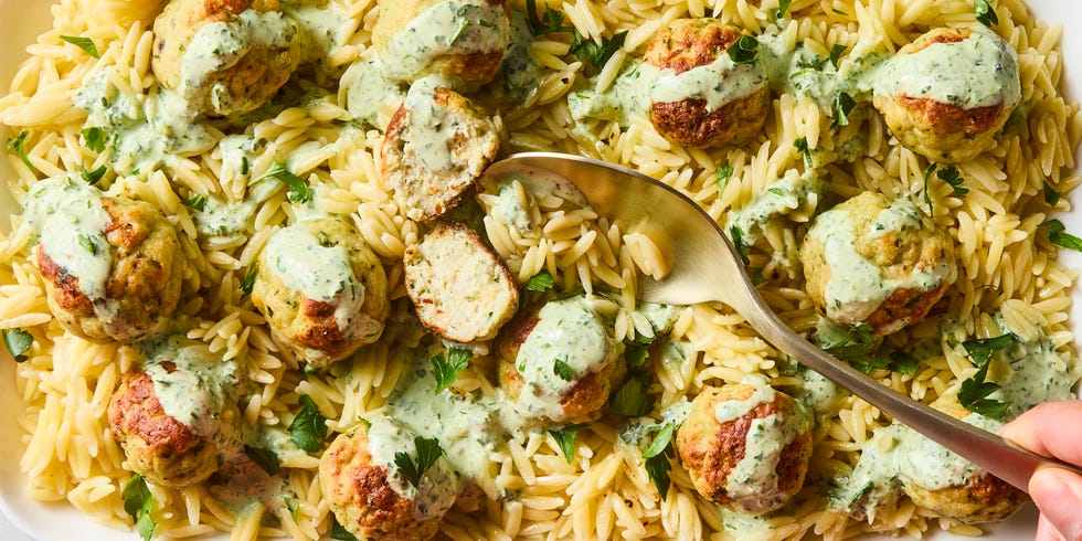 meatballs served on top of orzo with creamy green goddess dressing