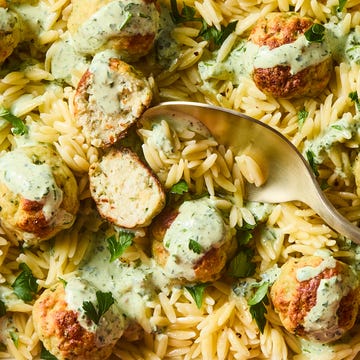 Green Goddess Meatballs meatballs served on top of orzo with creamy green goddess dressing