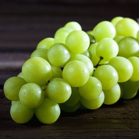 Green grape on wood