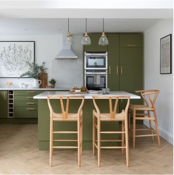 see how green preloved cupboards transformed this drab kitchen