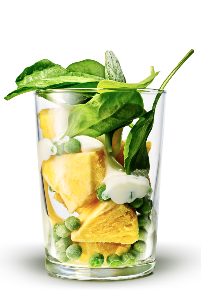 green smoothie with peas and pineapple before blended