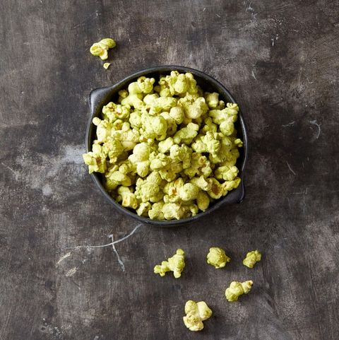 a bowl of green matcha popcorn