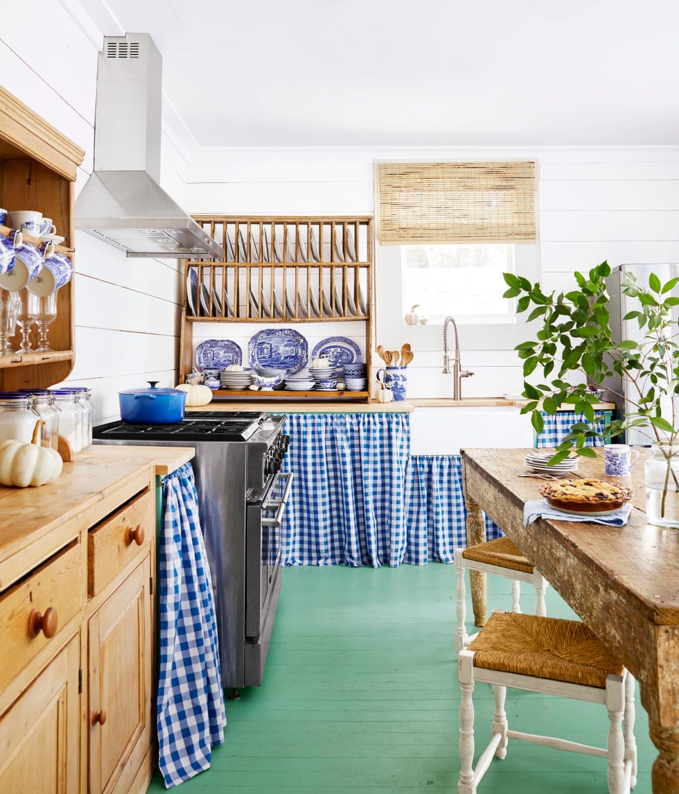 white farmhouse kitchen with green painted floor