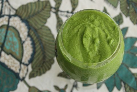 green smoothie in glass cup