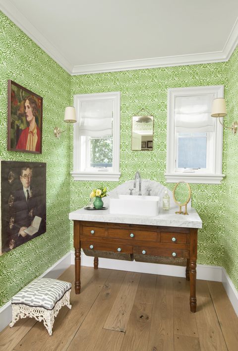 powder room with green wallpaper