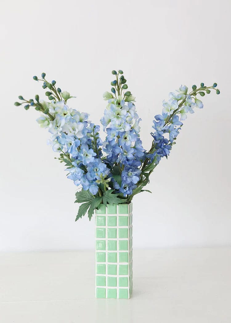 Vase with blue flowers