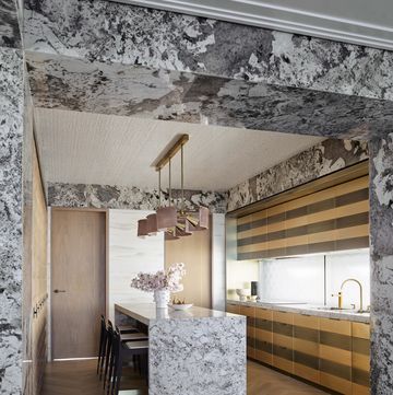 a kitchen with a marble portal