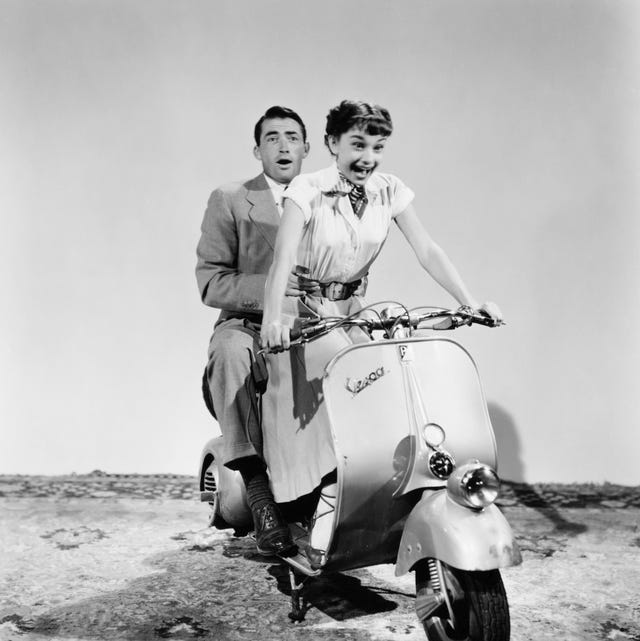 gregory peck and audrey hepburn riding moped