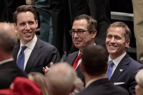 st charles, mo   november 29 missouri attorney general and us senate candidate josh hawley l r, treasury secretary steven mnuchin, and missouri gov eric greitens listen to us president donald trump during a rally at the st charles convention center on november 29, 2017 in st charles, missouri trump promoted the gop tax reform plan during the speech photo by whitney curtisgetty images