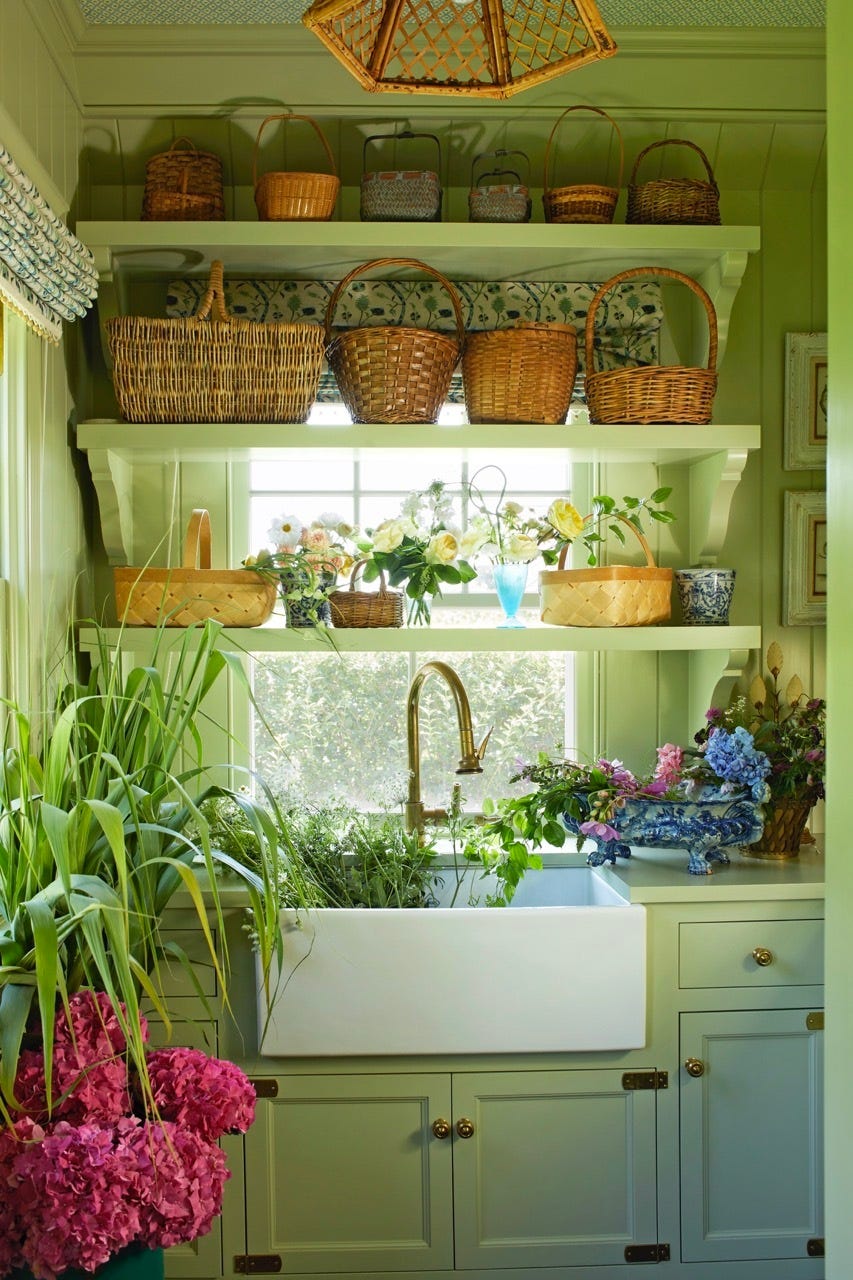 Flower room with flowers and green cupboards