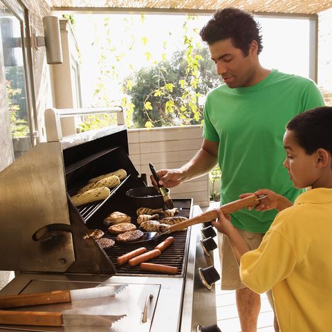 dad showing son about grill zones