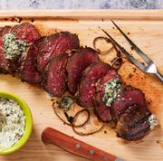 sliced grilled beef tenderloin with herb butter