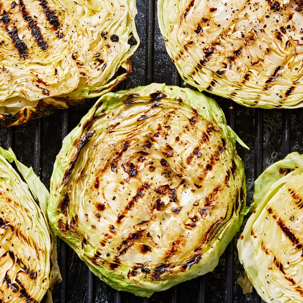 grilled cabbage steaks topped with bacon, sour cream and chives