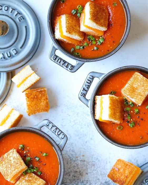 creamy tomato soup with grilled cheese croutons in mini pots