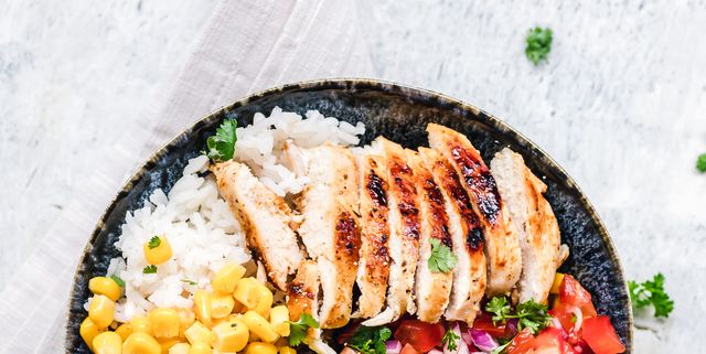 https://hips.hearstapps.com/hmg-prod/images/grilled-chicken-and-rice-salad-bowl-royalty-free-image-1571155844.jpg?crop=1.00xw:0.502xh;0,0.284xh&resize=640:*