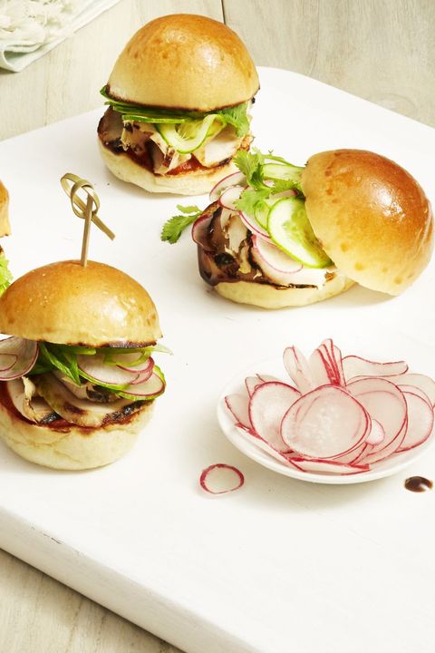 three grilled chicken sliders with a side of sliced radishes