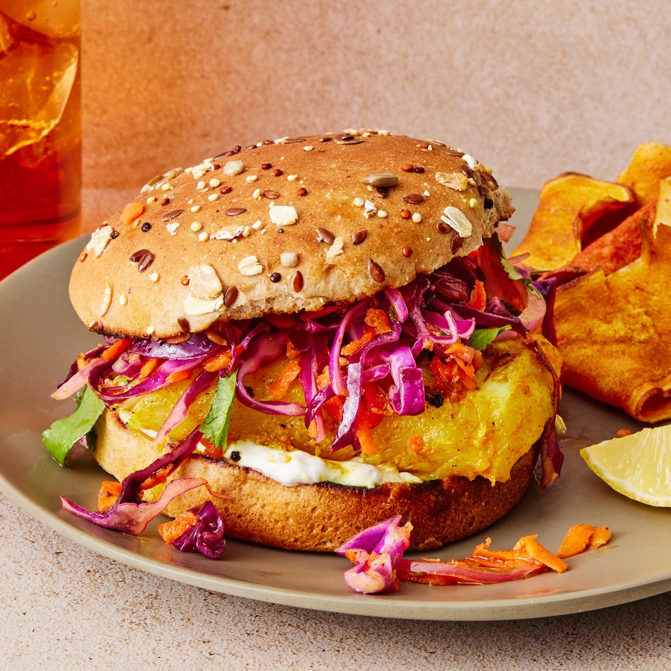 grilled fish sandwich with slaw and tzatziki on a multigrain bun