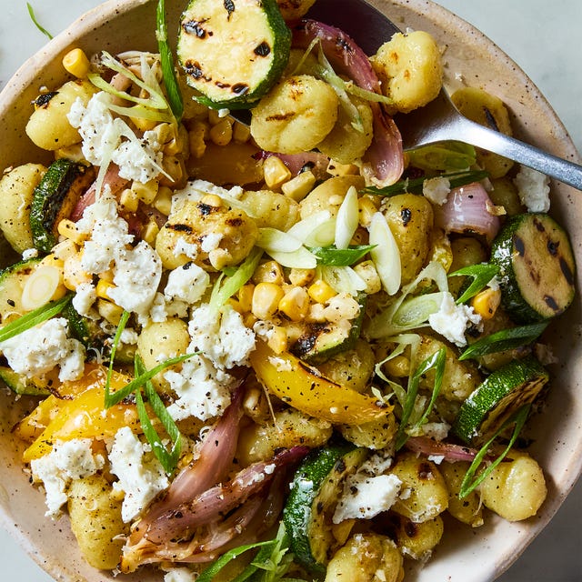 grilled gnocchi, zucchini, corn and onion salad