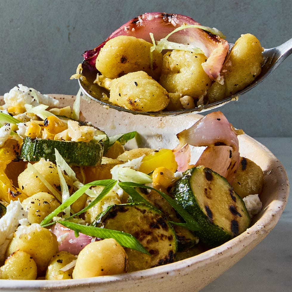 grilled gnocchi, zucchini, corn and onion salad