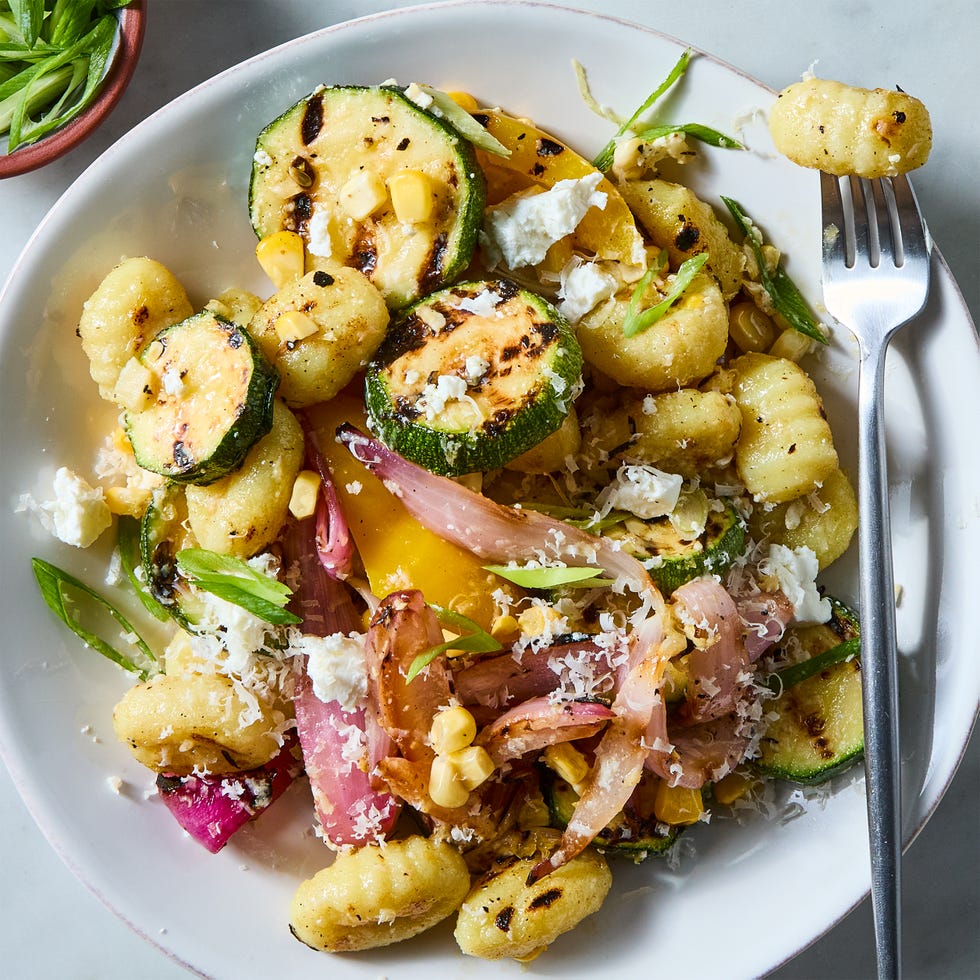 grilled gnocchi, zucchini, corn and onion salad