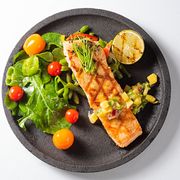 grilled salmon steak with green salad for mediterranean diet
