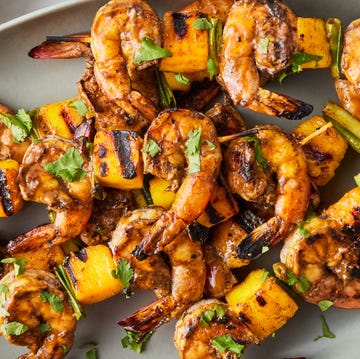 Grilled Shrimp & Mango Skewers marinated shrimp skewered with pieces of mango and a few scallions, then grilled and glazed with a tangy mango chutney bbq sauce